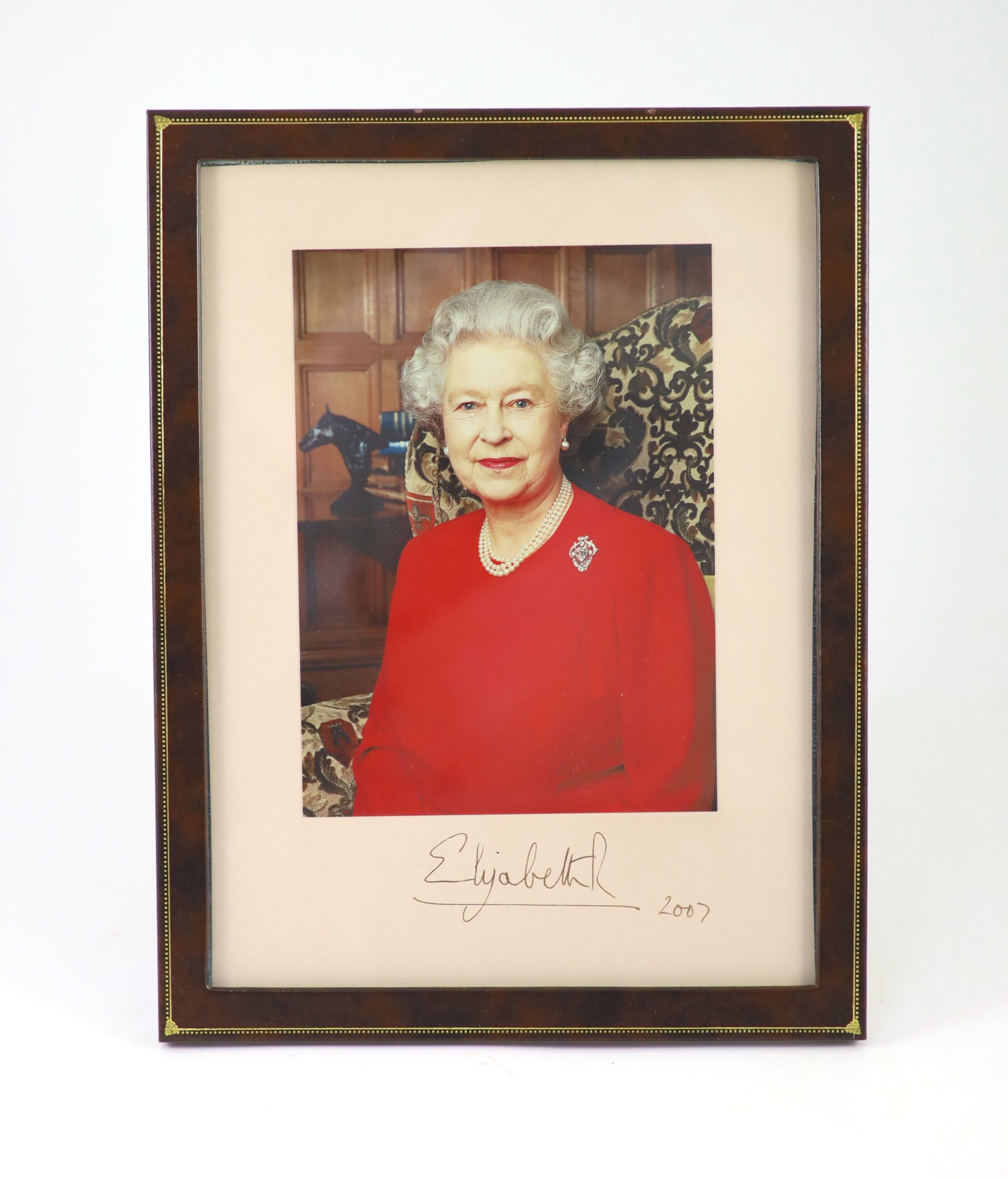 Elizabeth II, Queen of England - a colour photograph, signed on the mount, “Elizabeth R’’ and dated 2007, the image 19.5 x 14.5cms.
